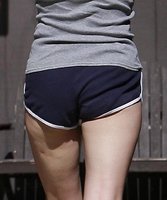 milla jovovich in shorts 06.jpg